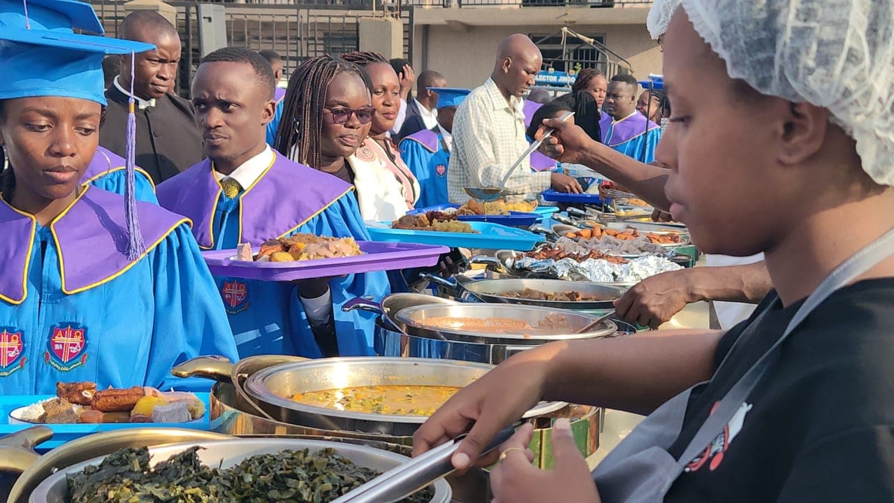 Staff serving guests at graduation event